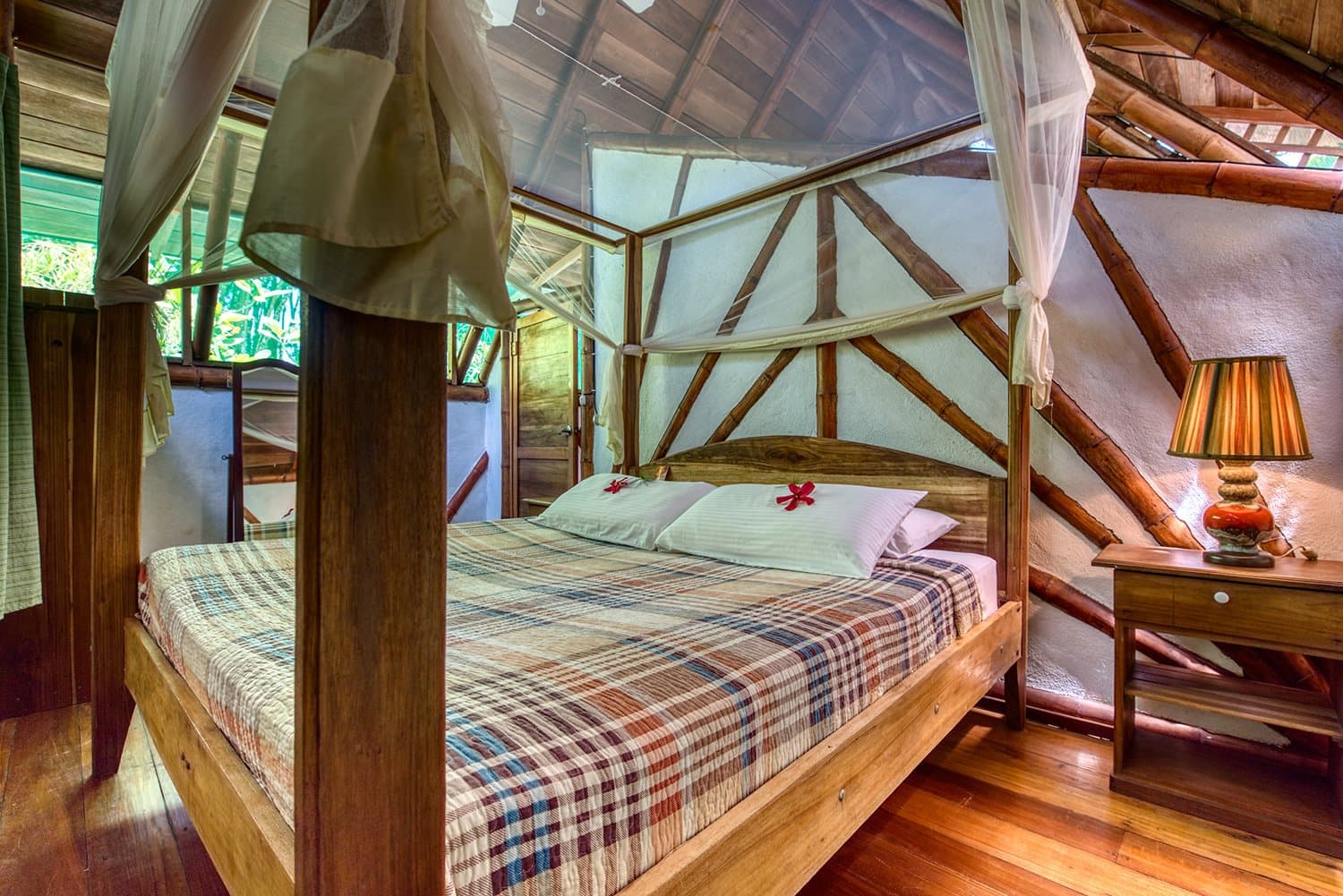The bamboo Garden House under the rainforest canopy at Punta Uva